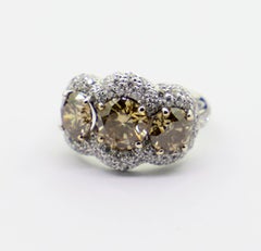 3.29 Carat Natural Brown Diamonds with White Diamond Pavè Three-Stone Ring