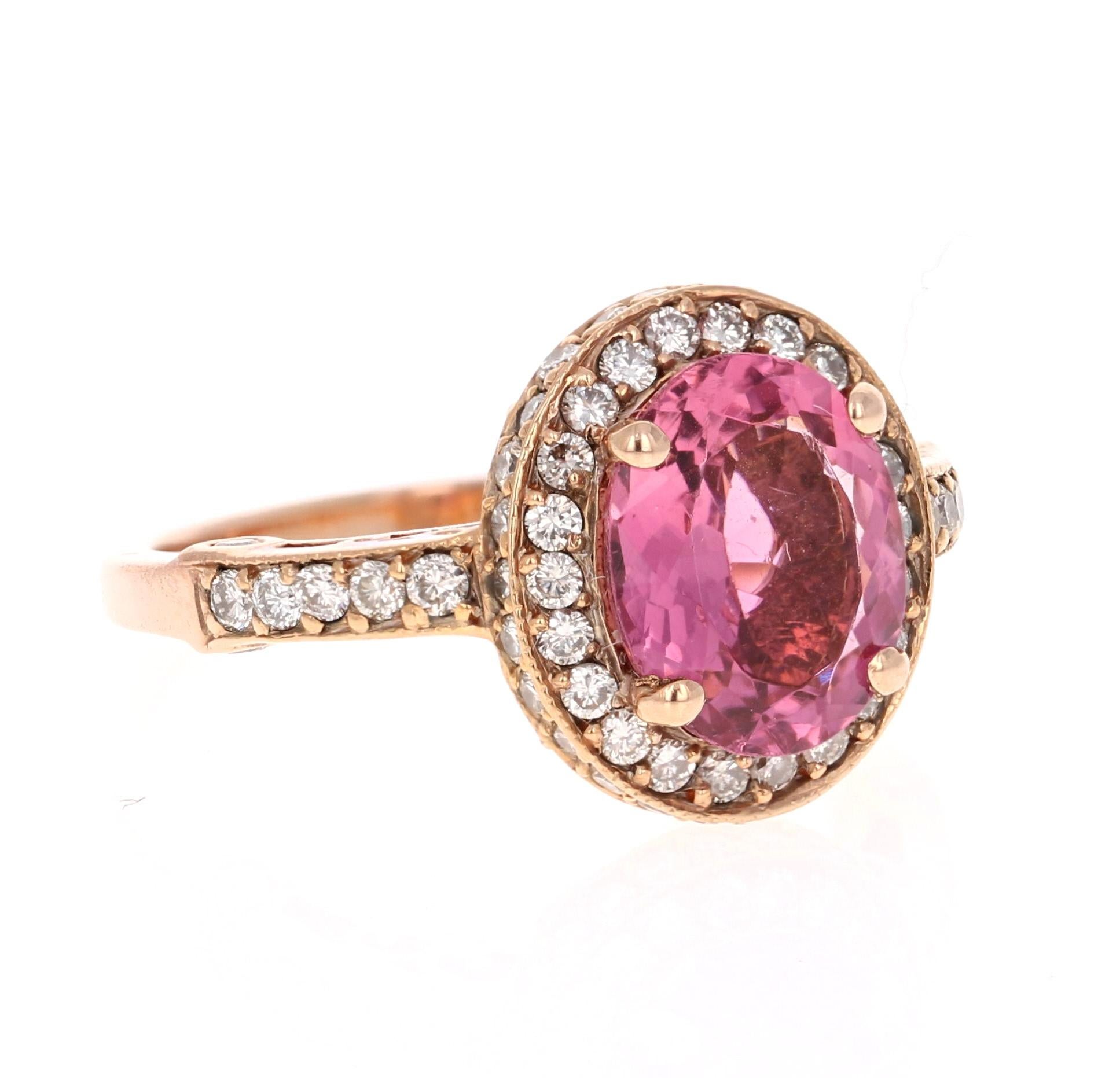 Beautiful and Radiant Pink Tourmaline Ring in a gorgeous Rose Gold Setting.

This ring has an Oval Cut Pink Tourmaline that weighs 2.46 Carats. Floating around the tourmaline are 74 Round Cut Diamonds weighing 0.83 Carats. 
The total carat weight of