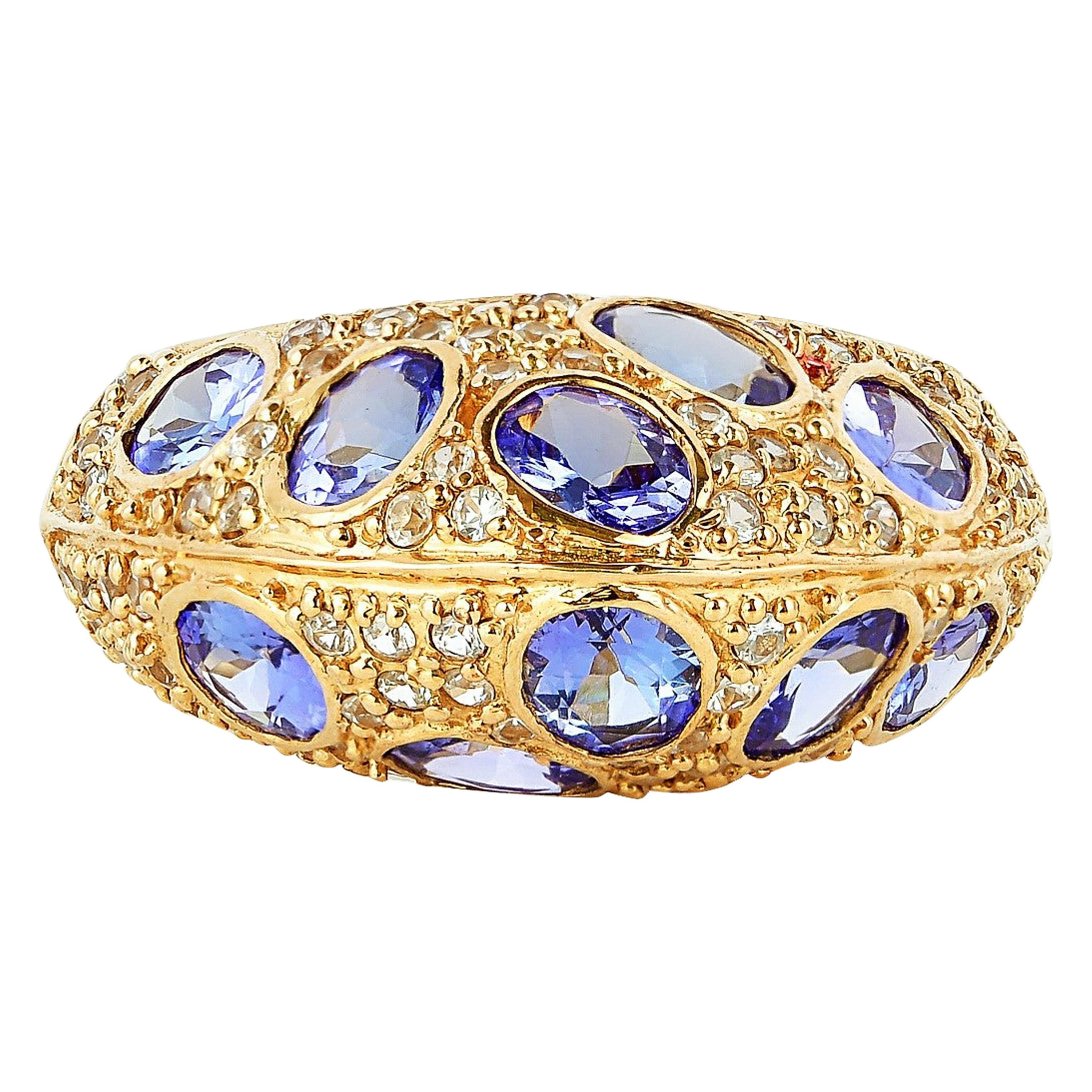 3.29 Carat Tanzanite and White Sapphire Ring in 18 Karat Yellow Gold