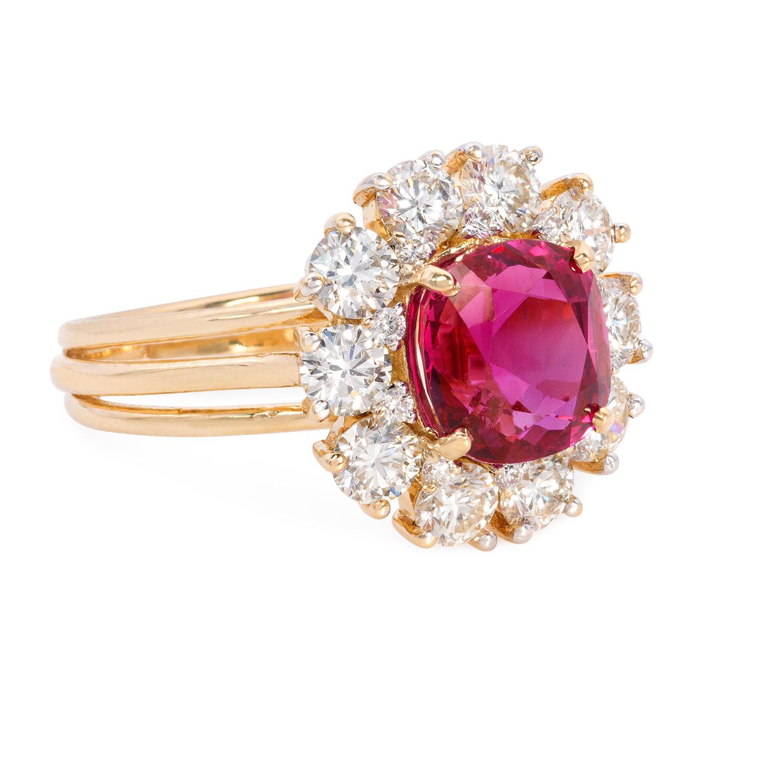 Immerse yourself in the unforgetfull glamour of this truly exceptional ring. 

At its heart lies a magnificent 3.29 Carat Natural Ruby of Burmese origin, a gemstone that embodies passion and vitality with its deep red hue. Embracing this exquisite