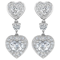 Boucles d'oreilles en platine avec diamants ronds et en forme de cœur de 3,29ct