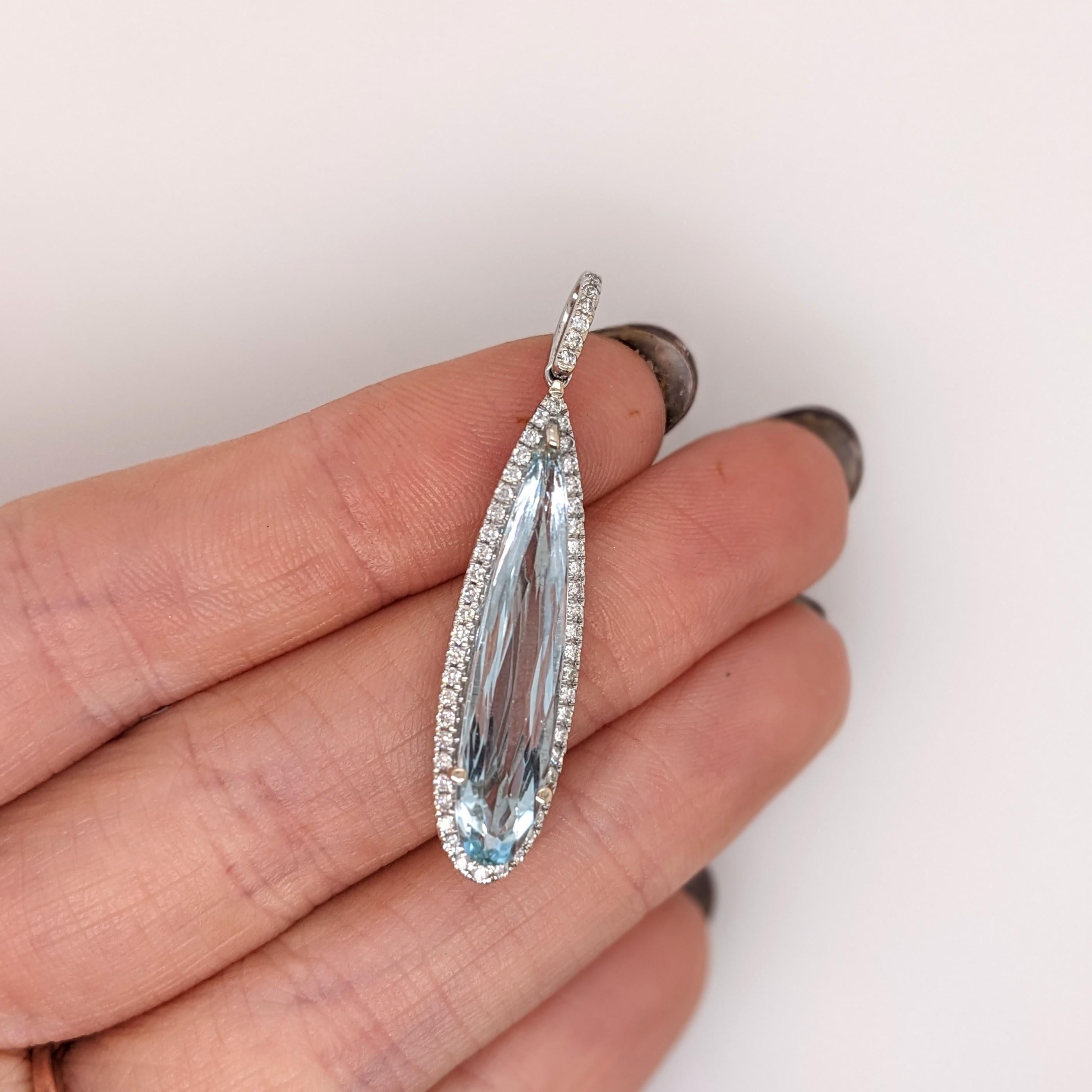 This beautiful pendant features a 3.26 carat Aquamarine with a halo of natural earth mined diamonds and a diamond studded bail, set in solid 14K gold. This pendant makes a lovely March Birthstone gift for your loved ones!

Specifications:

Item