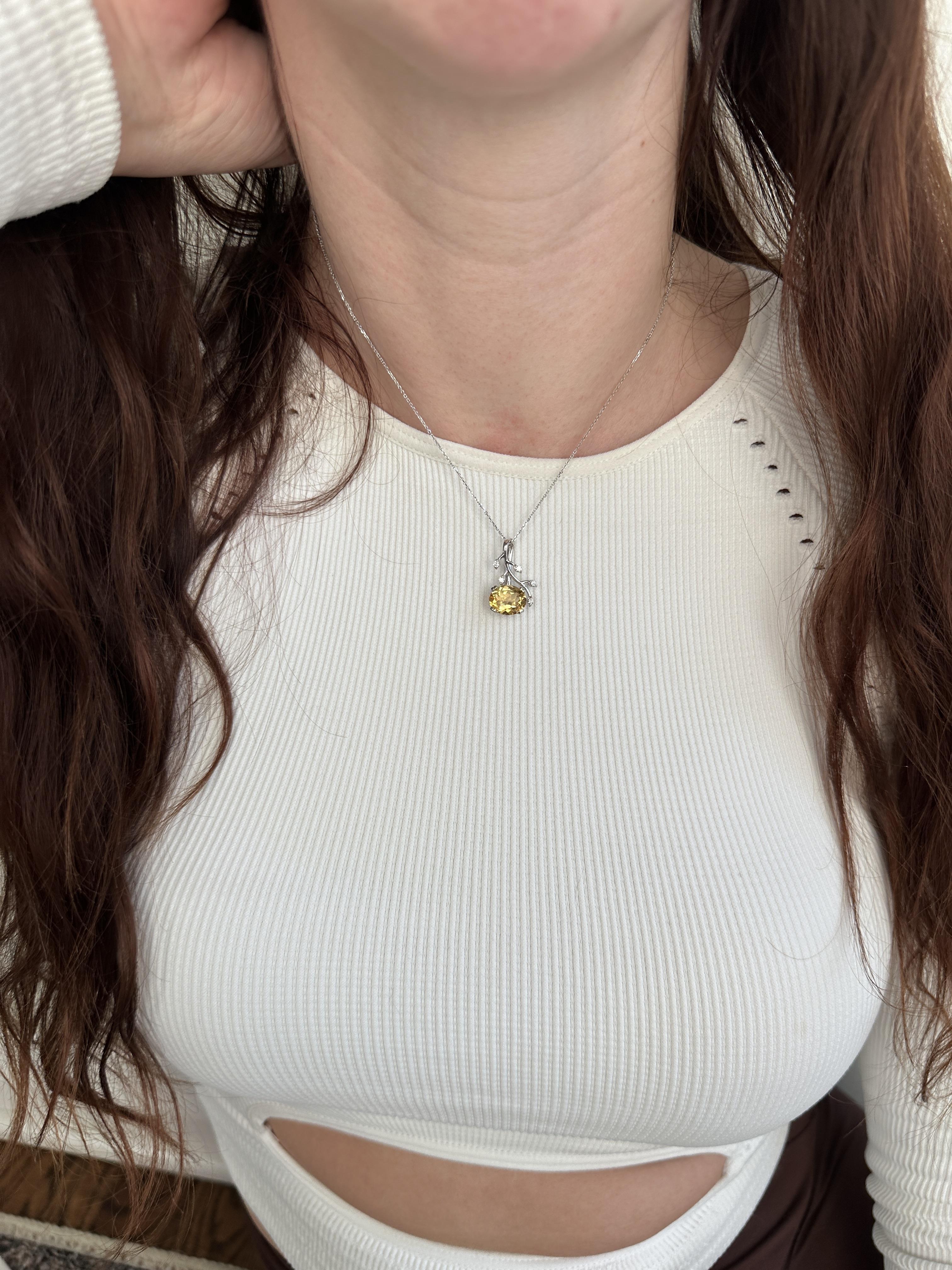 This beautiful nature-inspired bail pendant features a 3.23 carat citrine gemstone with natural earth mined diamonds set in solid 14K gold. This citrine pendant makes a lovely November birthstone gift for your loved ones! **Chain Sold