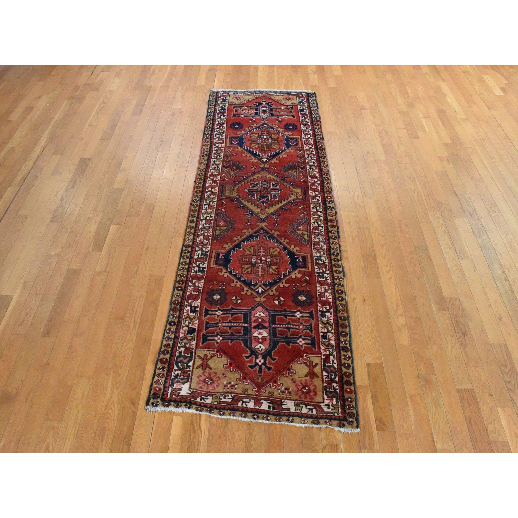 Tomato Red, Semi Antique Persian Heriz, Geometric Medallion Design, Clean, Full and Soft Even Pile, 100% Wool, Hand Knotted, Oriental, Wide Runner Rug
Primary materials: Wool
Latex: No Pile 
height: 0.25 Inches
Style: Traditional
Primary color:
