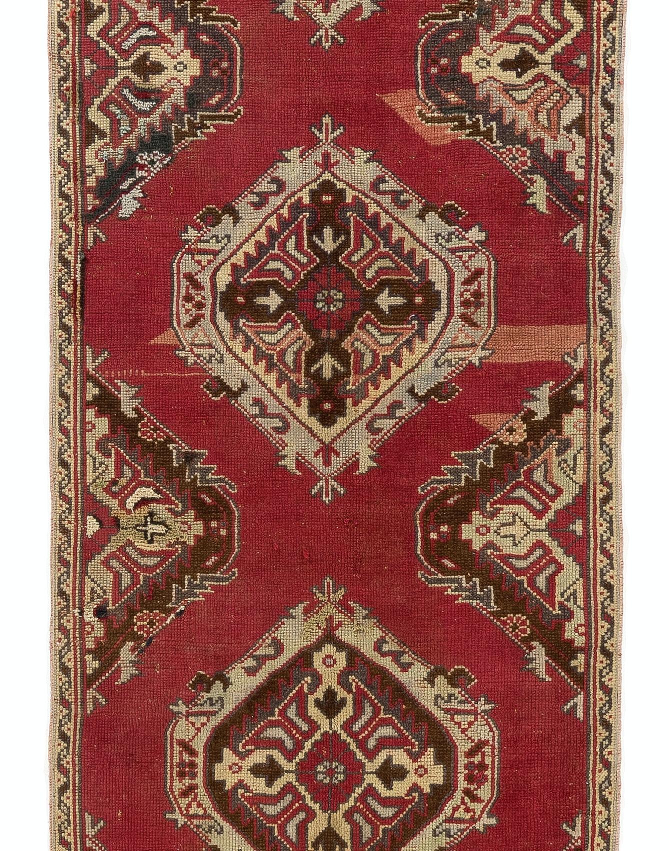 A vintage Turkish runner rug. Finely hand-knotted with even medium wool pile on cotton foundation. Very good condition. Sturdy and as clean as a brand new rug (deep washed professionally).

Size: 3.2 x 13.6 Ft.