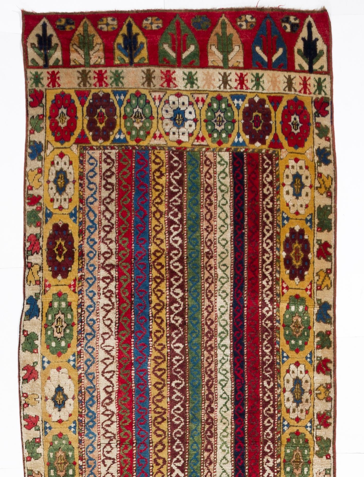 A vintage hand knotted runner rug from Central Anatolia with wool pile on wool foundation. Very good condition, sturdy and as clean as a brand new rug.

This rug is made of 100% natural dyed hand-spun wool, no chemical dyes. 
Size: 3.3 x 14.5 Ft