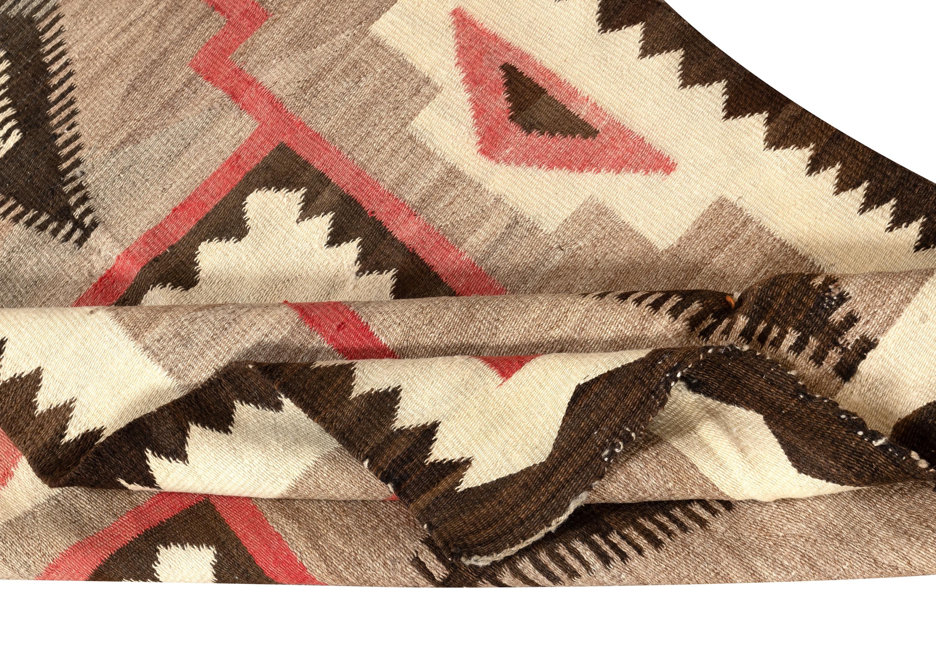 Kilim Tappeto antico Navajo con motivo a tempesta, lana, colori naturali, 1930-1950 circa in vendita