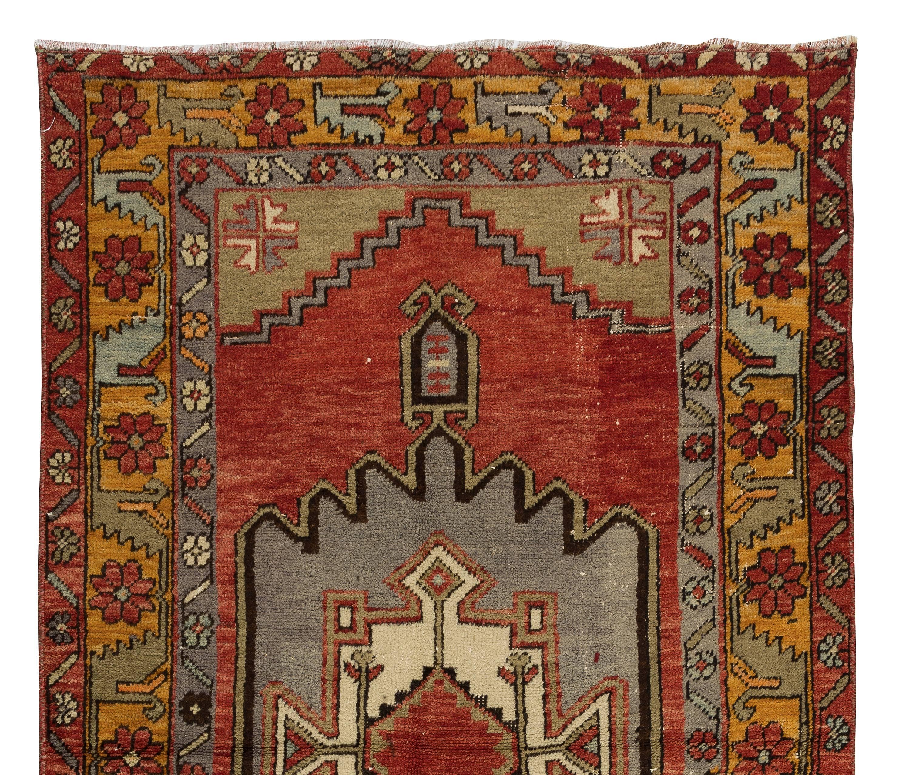 Hand-Knotted Vintage Handmade Turkish Accent Rug with Geometric Medallion Design For Sale