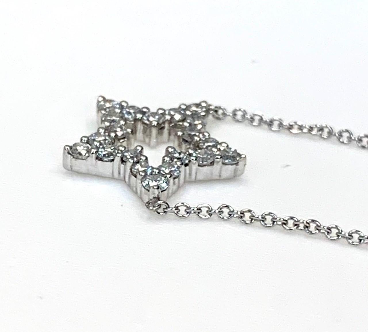 Show the world you're a star! This pretty, little sparkler is set with round brilliant cut diamonds set in 18k white gold for a look that will always remind you how special you are! Time to treat yourself!

Necklace is 16 inches in length
21 round