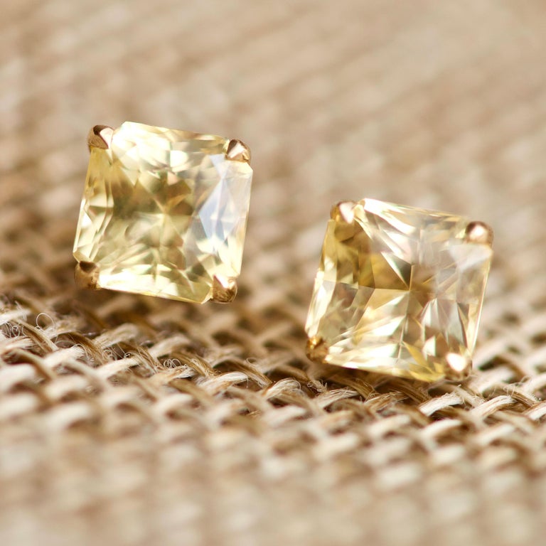 We have a wonderful option for those who wants everything at once - stud earrings with natural yellow sapphires. 
Sapphires in these earrings have very nice warm yellow shade that is similar to the shade of yellow diamonds  The stones have an