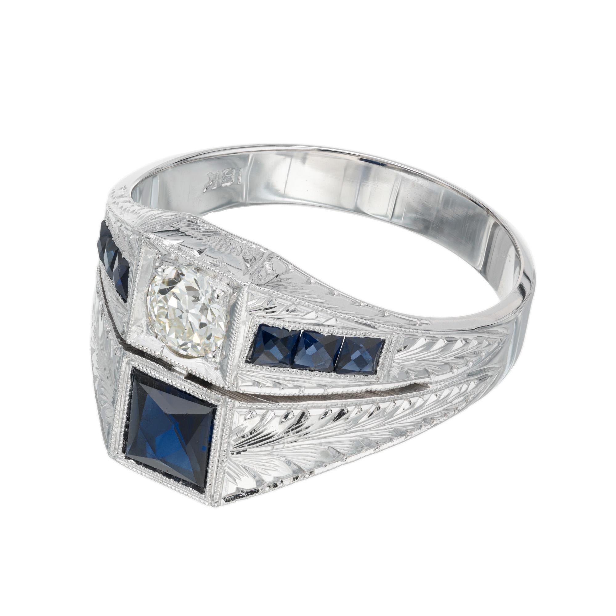 Vintage Art Deco handmade 18k white gold .33 carat Old European cut diamond men's ring circa 1936. Beautifully hand engraved and set with a bright Old European cut diamond and custom cut French style square bright clear blue man made sapphire,