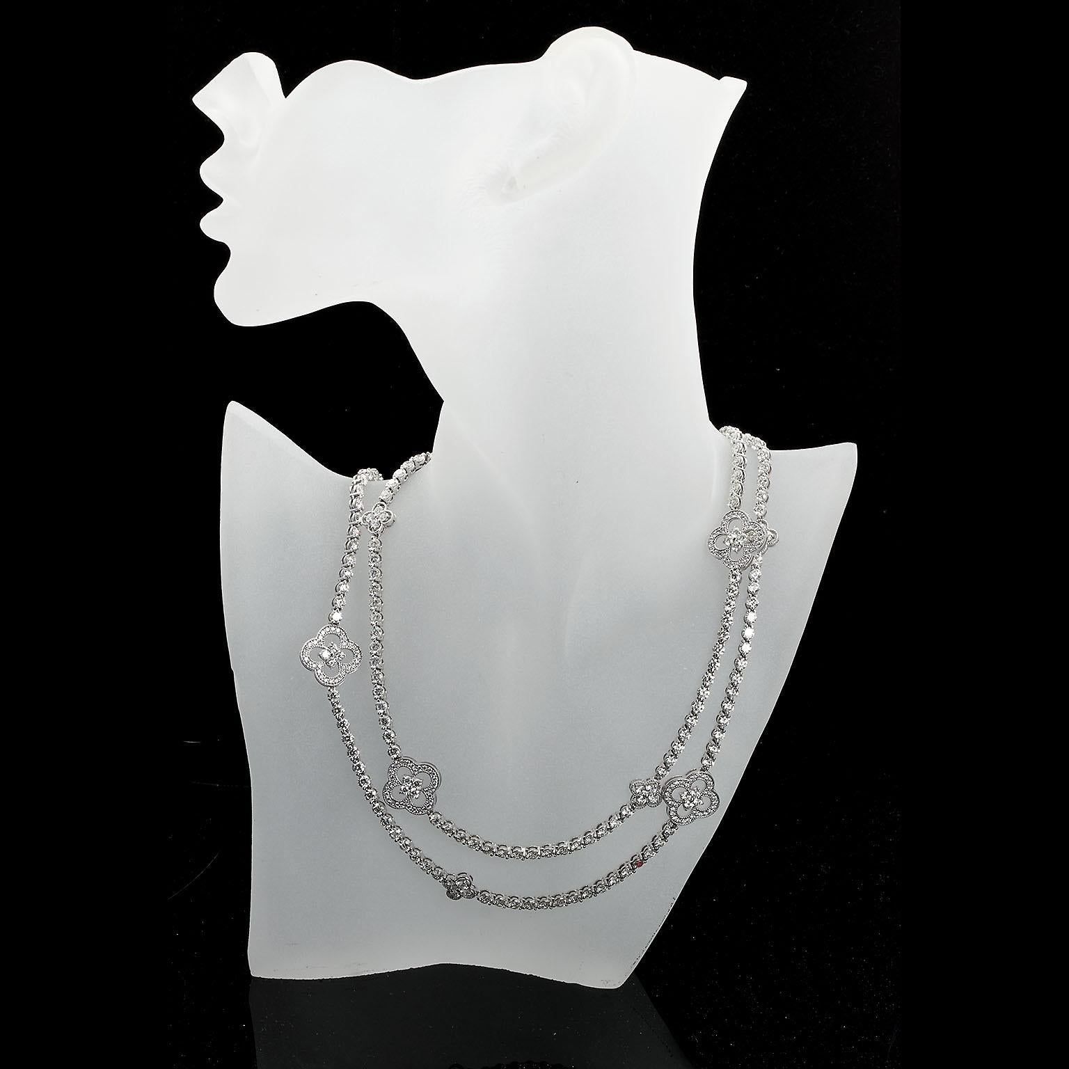 A diamond in 18k white gold opera length necklace. A remarkable necklace can be worn single opera style or double and short. Features six larger clover shaped florets (3/4 inches/ 19mm wide) and another six smaller clover shaped florets.

Set with