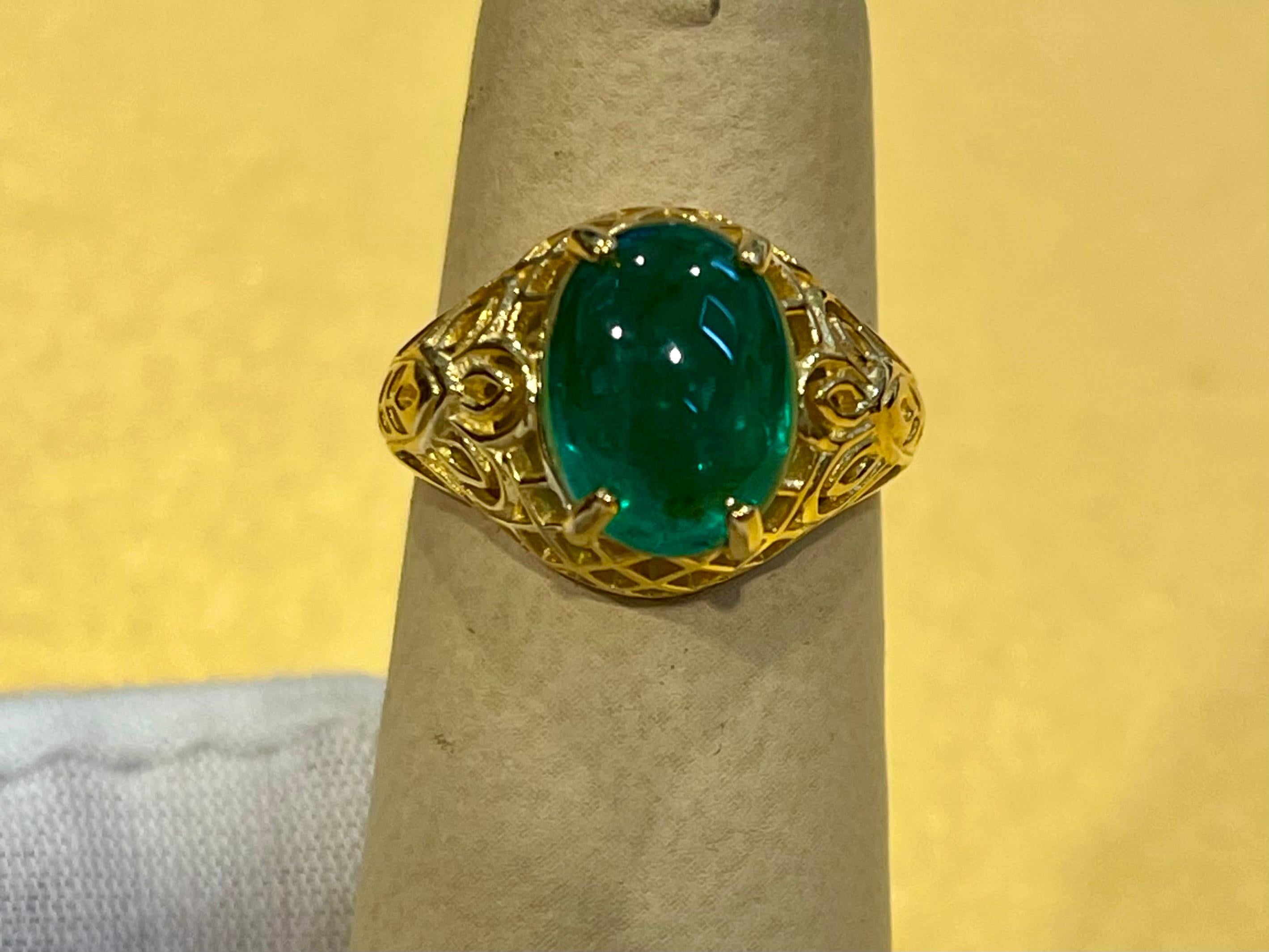 Women's 3.3 Carat Oval Emerald Cabochon 14 Karat Yellow Gold Cocktail Ring Vintage For Sale