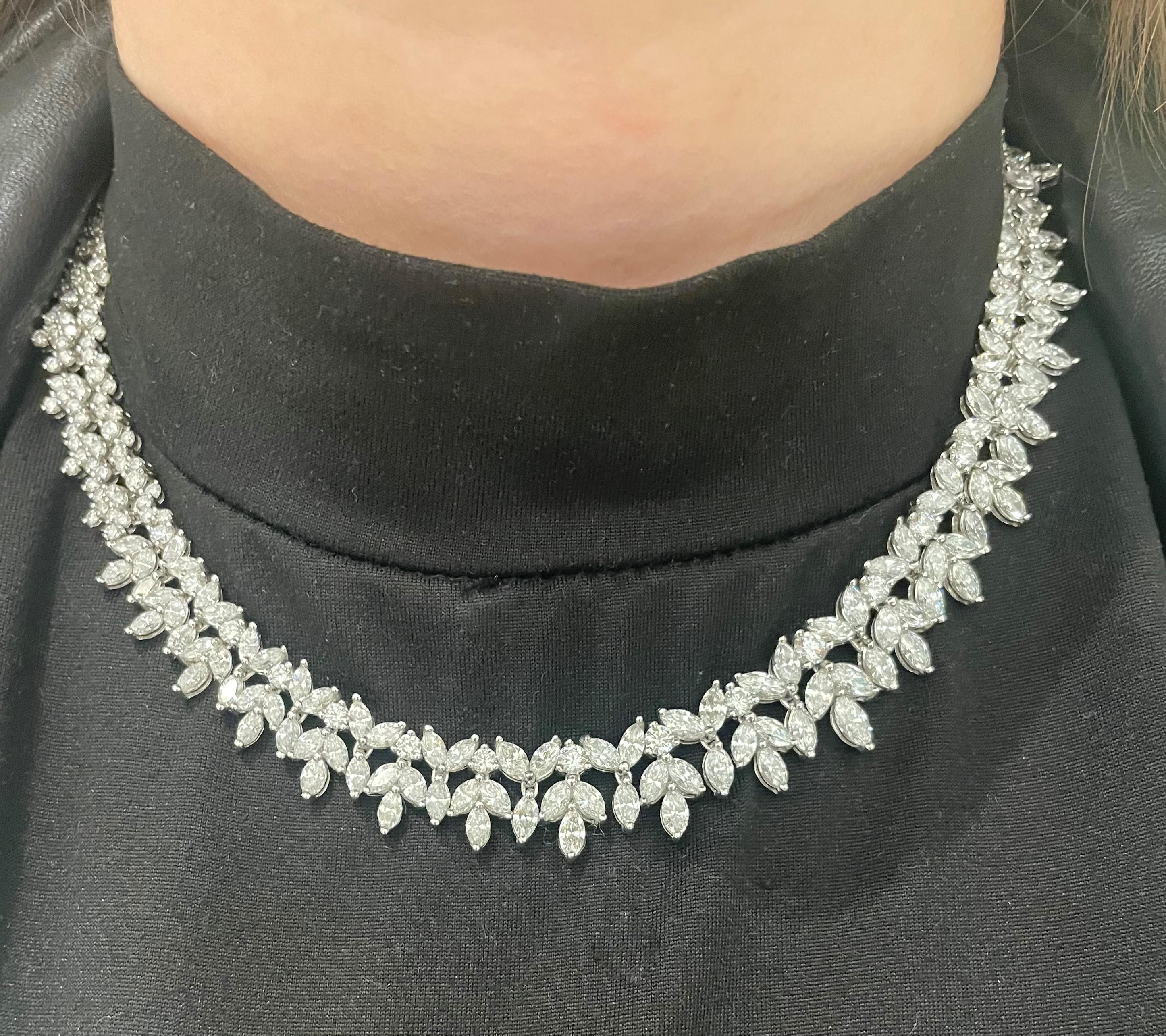 From the Eiseman Estate Jewelry Collection, platinum diamond wreath necklace. This necklace is crafted with 326 round brillaint cut diamonds with a combined weight of 13.14 carats accented by 123 marquise diamonds with a combined weight of 19.92