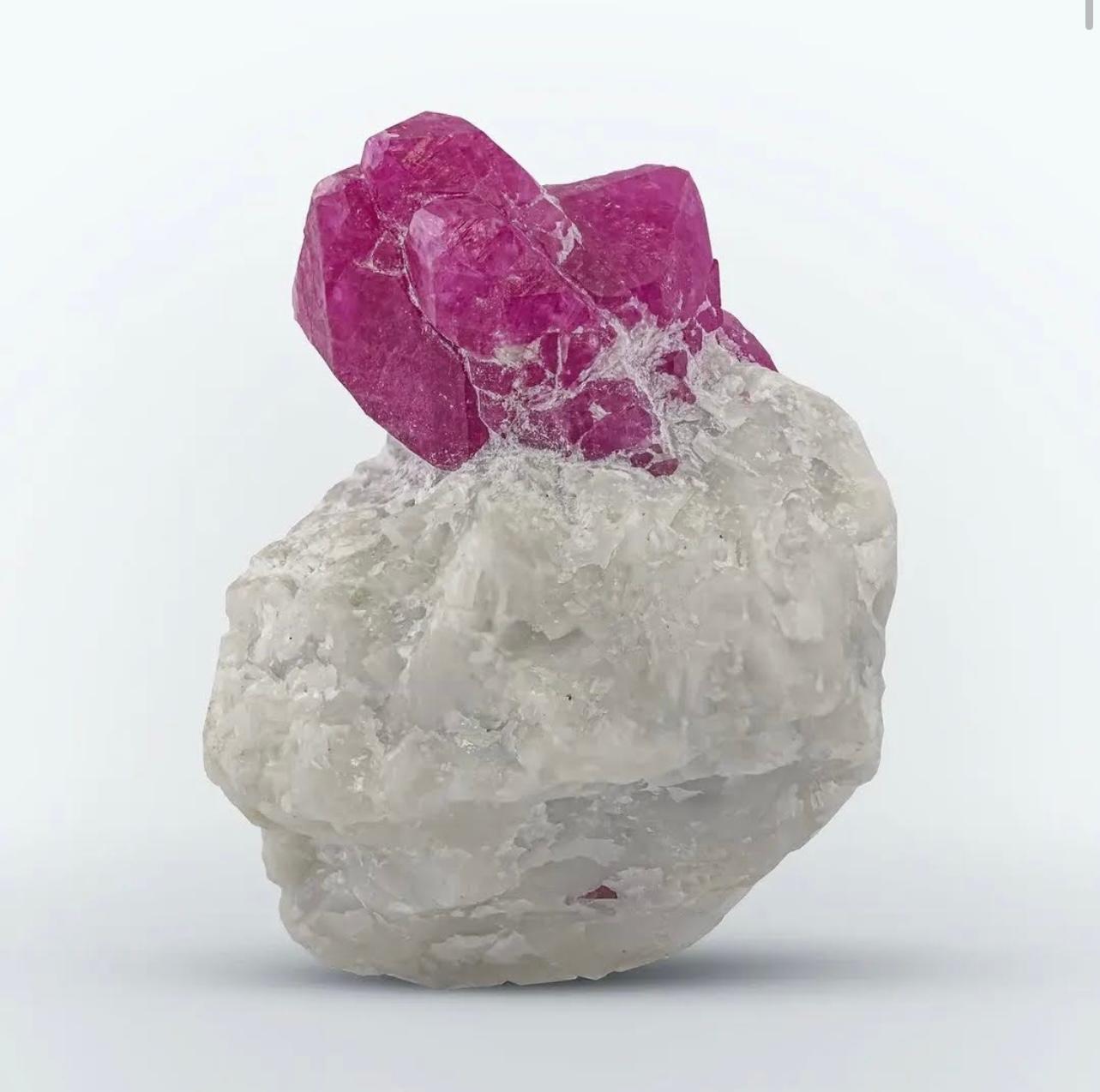 Product Information:

Specimen Type: Ruby crystals on Marble matrix

Weight: 33 grams

Dimensions: H: 3.8 x W: 3 x D: 2 cm 

Origin: Jagdalak Mine, Surobi District, Kabul Province, Afghanistan

Treatment: None

Description: 

This specimen features