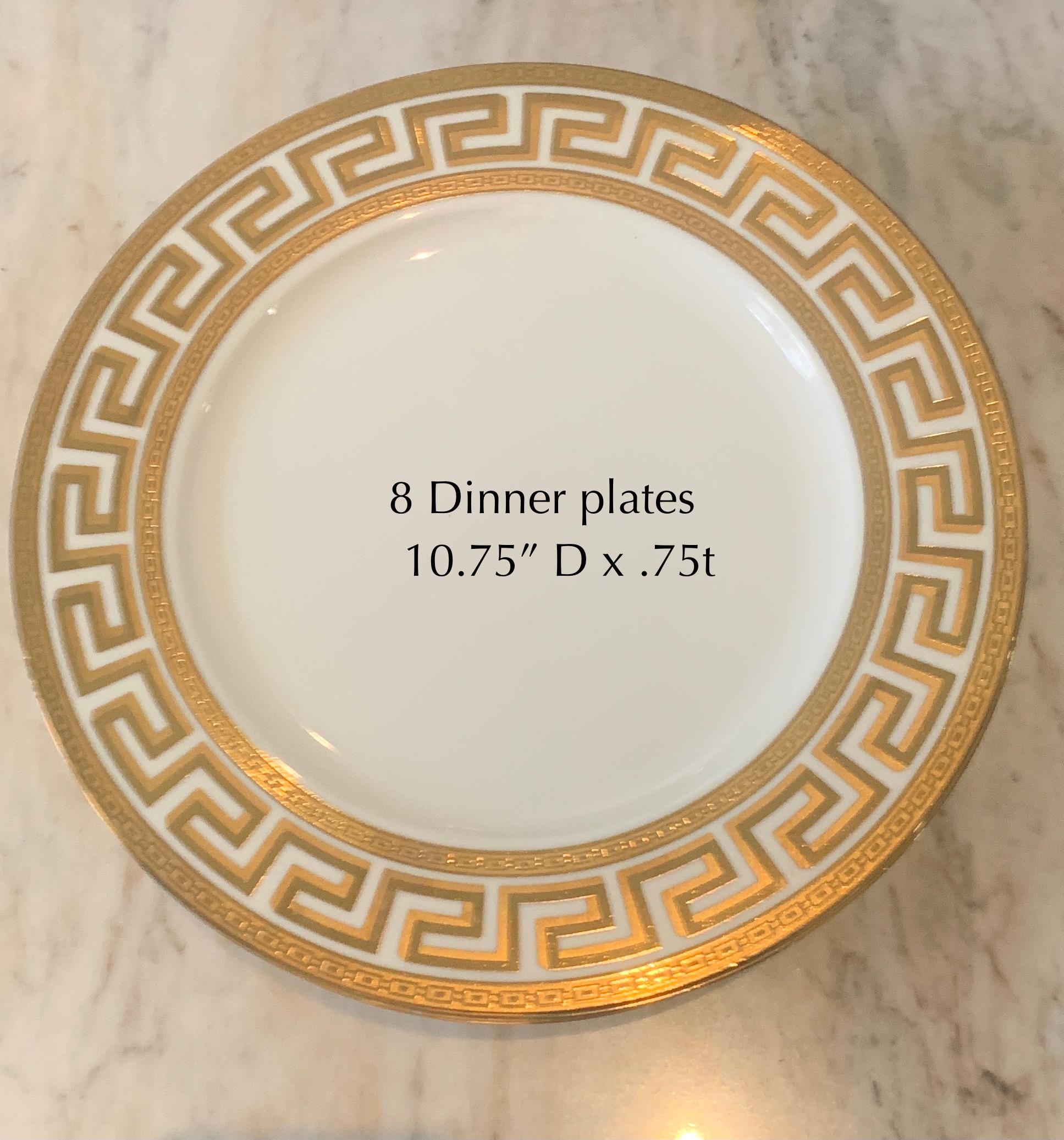 An impressive set of German Porcelain dinner ware - The Hollywood Regency Sophisticated Greek Key pattern in Gold will give any table the look of Versace. The set has a tea service of 6, or a dinner and soup service for 8. Also included are a tea