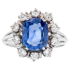 Bague halo en or blanc 14K avec saphir bleu de 3,30 carats et diamant de 0,70 carat