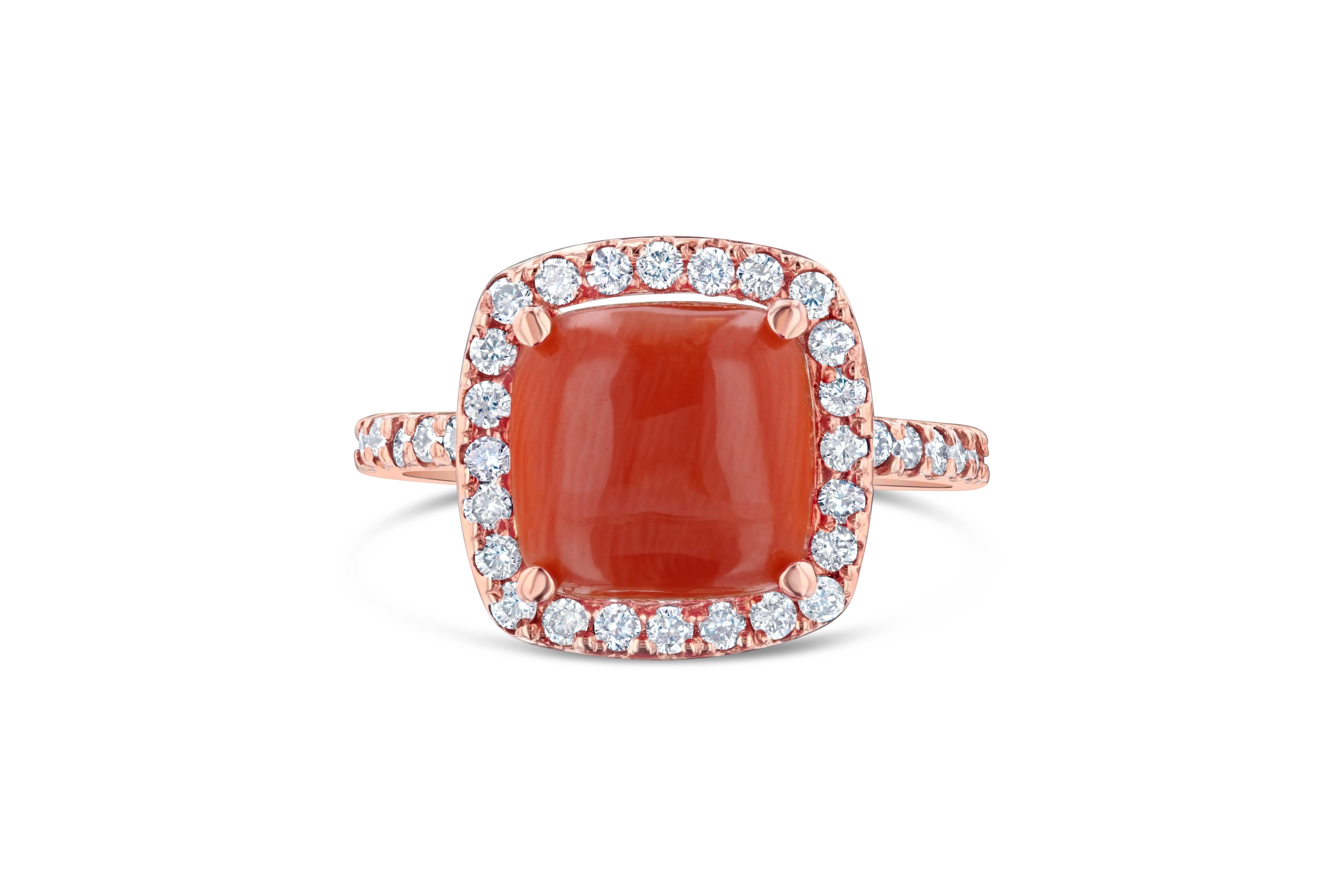 This beautiful ring can be worn however one pleases! It is delicately set and can be the most unique engagement or wedding ring or perhaps even an everyday ring...
The Coral is 2.69 Carats and is adorned by a halo of 46 Round Cut Diamonds weighing