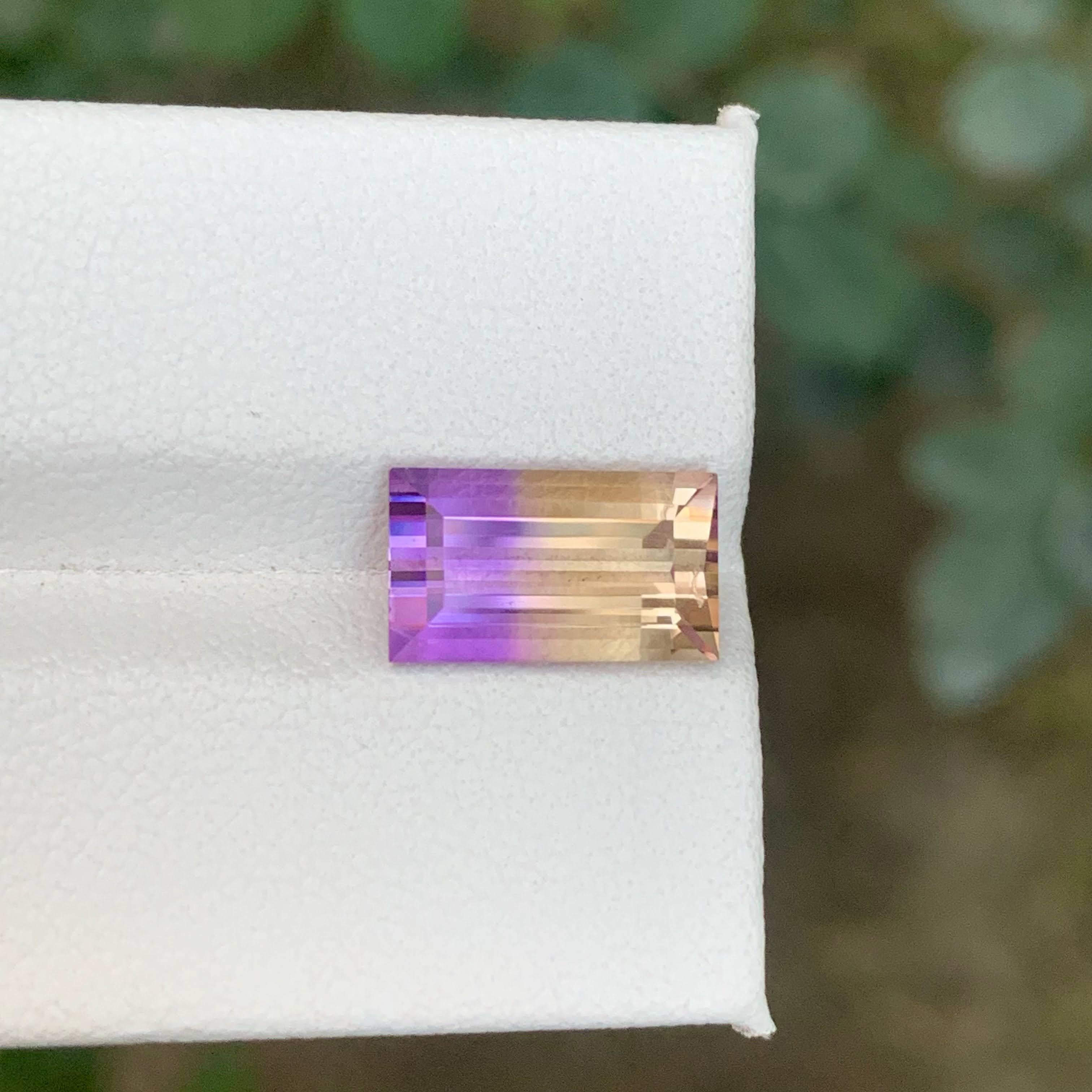 Weight 3.30 carat 
Dimensions 11.8x6.8x5.2 mm
Treatment None 
Origin Bolivian 
Clarity Eye Clean 
Shape Cut Baguette 




This unique 3.30 Carat Natural Bi-Color Ametrine showcases a beautifully balanced blend of golden citrine and purple amethyst,