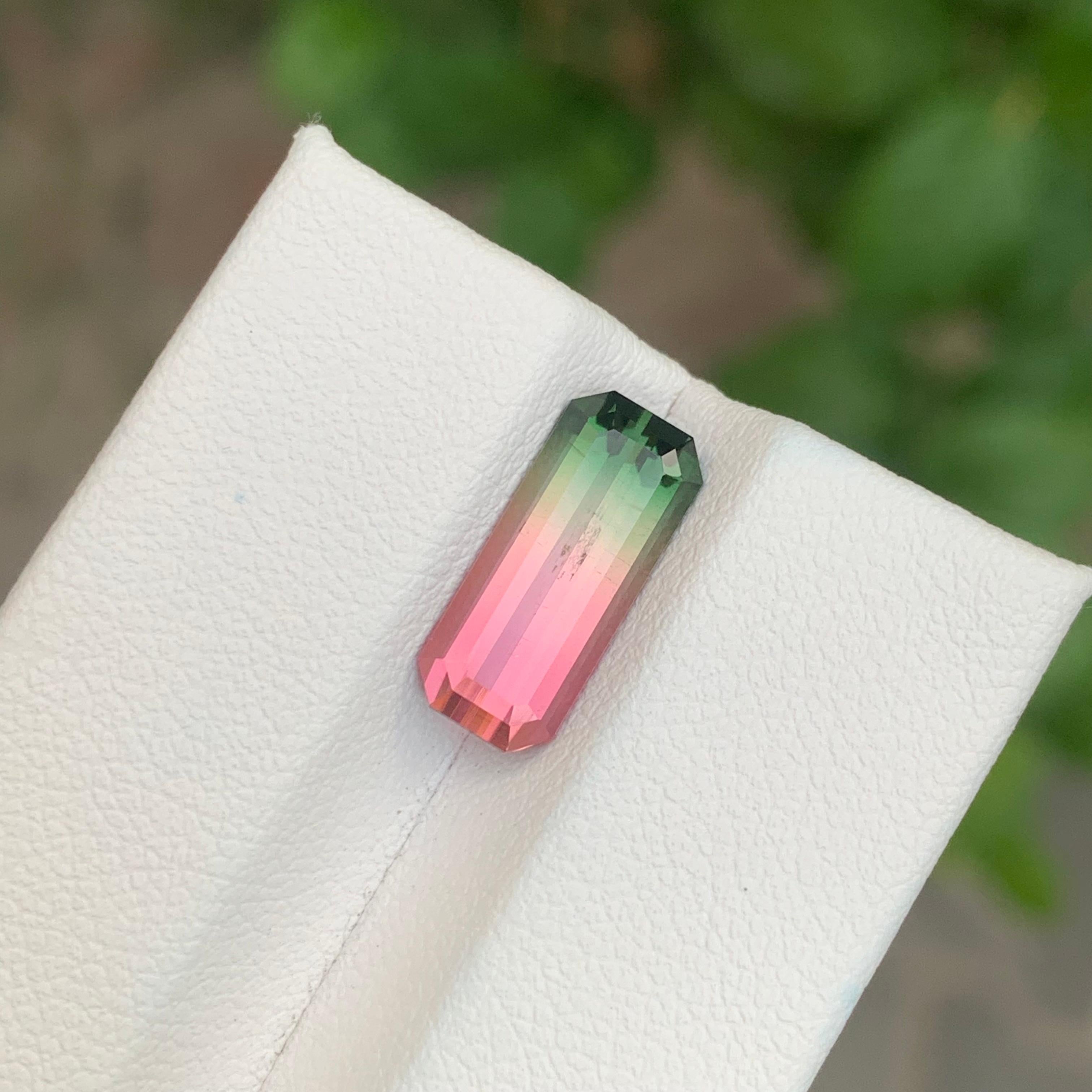 Women's or Men's 3.30 Carat Natural Loose Parti Tourmaline Long Emerald Shape Gemstone For Sale