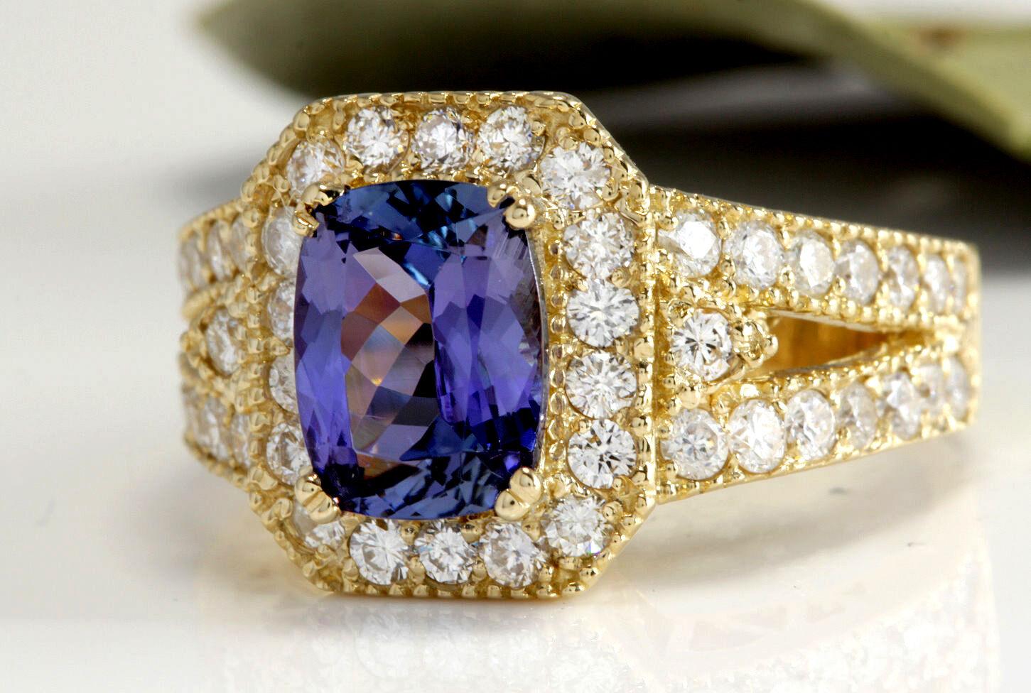 3.30 Carats Natural Very Nice Looking Tanzanite and Diamond 18K Solid Yellow Gold Ring

Suggested Replacement Value:  Approx. $7,000.00

Total Natural Oval Cut Tanzanite Weight is: Approx. 2.10 Carats

Center Tanzanite Measures: 9.00 x 7.00