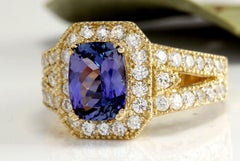 3.30 Carat Natural Tanzanite and Diamond 18 Karat Solid Gold Ring
