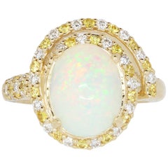3.30 Carat Opal, 0.30 Carat Yellow Sapphire and White Diamond Ring