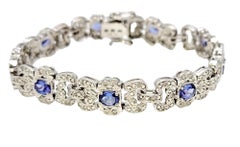 Bracciale ovale con tanzanite e pavé di diamanti in oro bianco da 3,30 carati complessivi