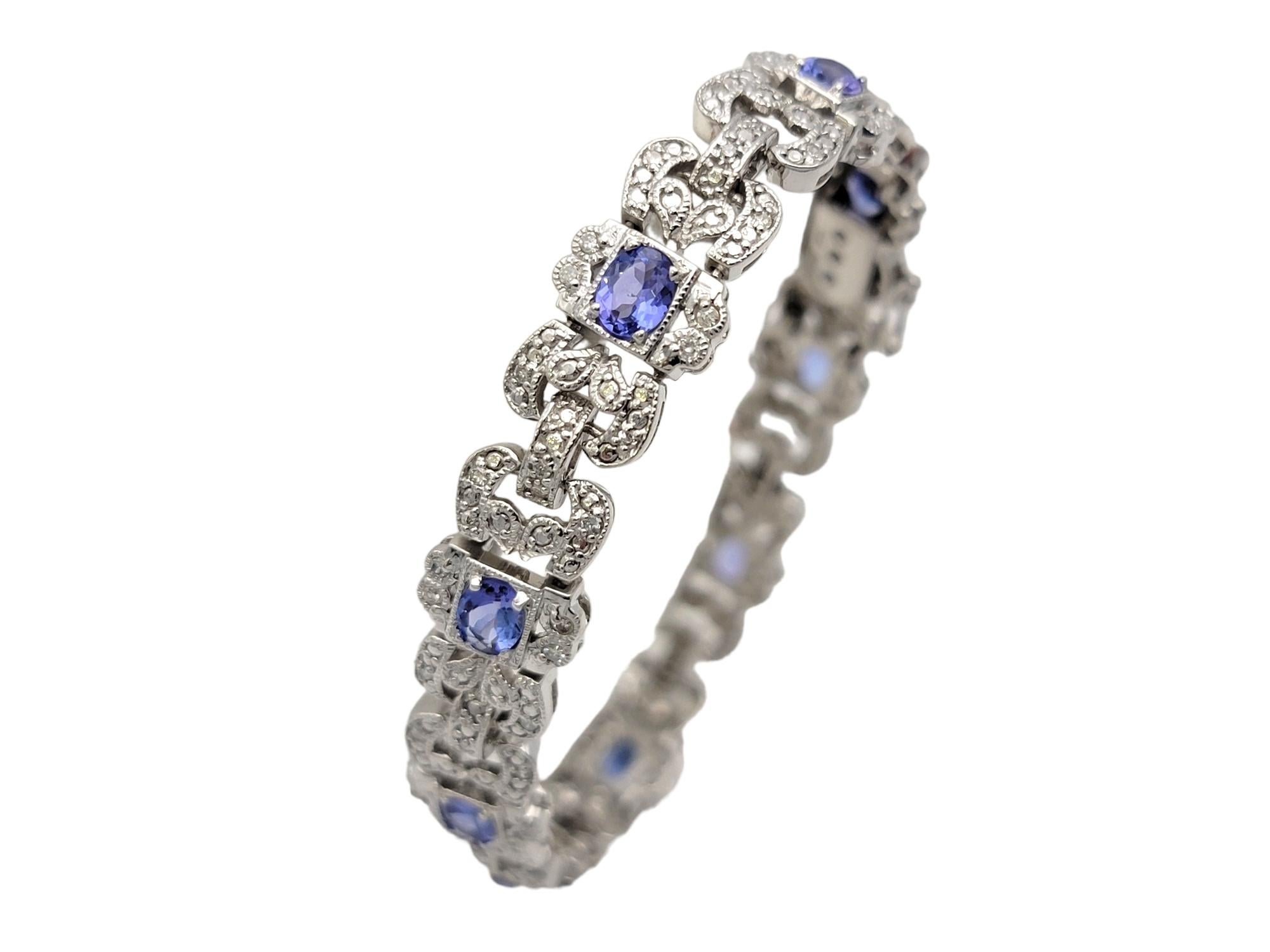 Oval Cut 3.30 Carat Total Oval Tanzanite and Pave Diamond Milgrain Bracelet in White Gold For Sale