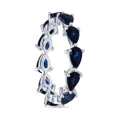 3.30 Carat Total Weight Natural Blue Sapphire Chasing Pear Band