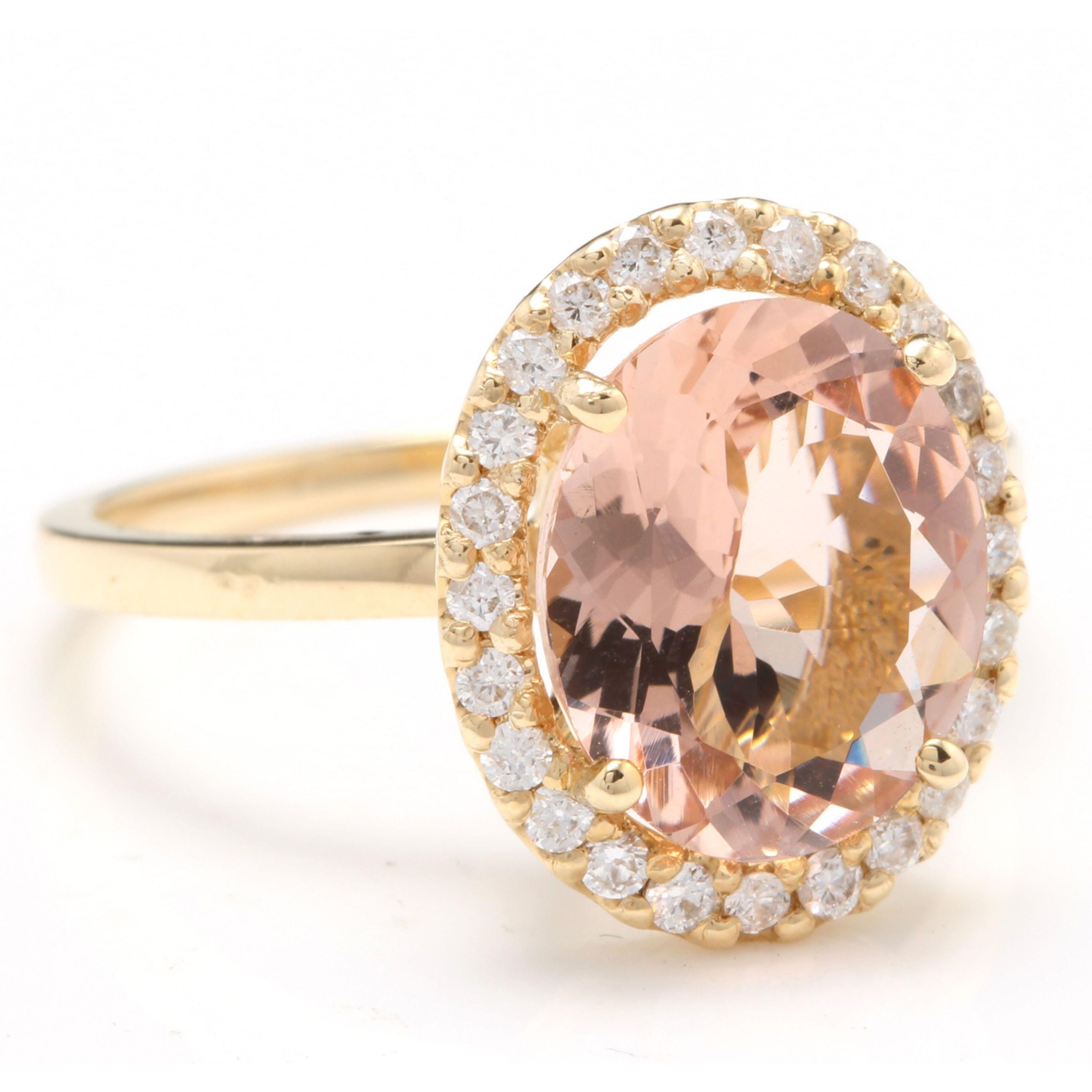 3.30 Carats Impressive Natural Morganite and Diamond 14K Solid Yellow Gold Ring

Total Morganite Weight is: Approx. 3.00 Carats

Morganite Treatment: Heating

Morganite Measures: Approx. 11.00 x 9.00mm

Natural Round Diamonds Weight: Approx. 0.30