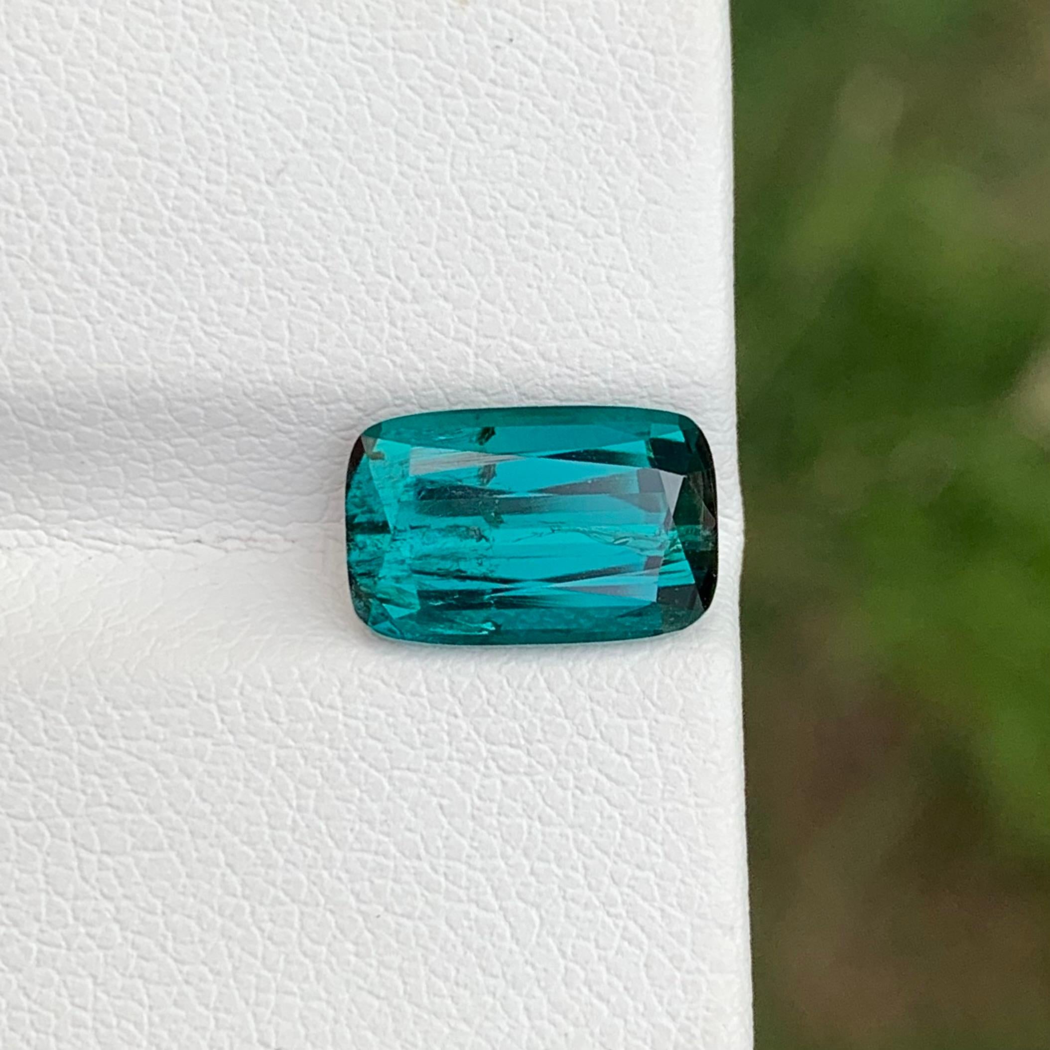 Loose Blue Tourmaline 

Weight: 3.30 Carats
Dimension: 10.9 x 7 x 5.1 Mm
Origin: Afghanistan 
Shape: Long Cushion
Colour: Azure Blue
Treatment: None
Certificate: On Demand
.
Indicolite Tourmaline is a rare and captivating variety of tourmaline,