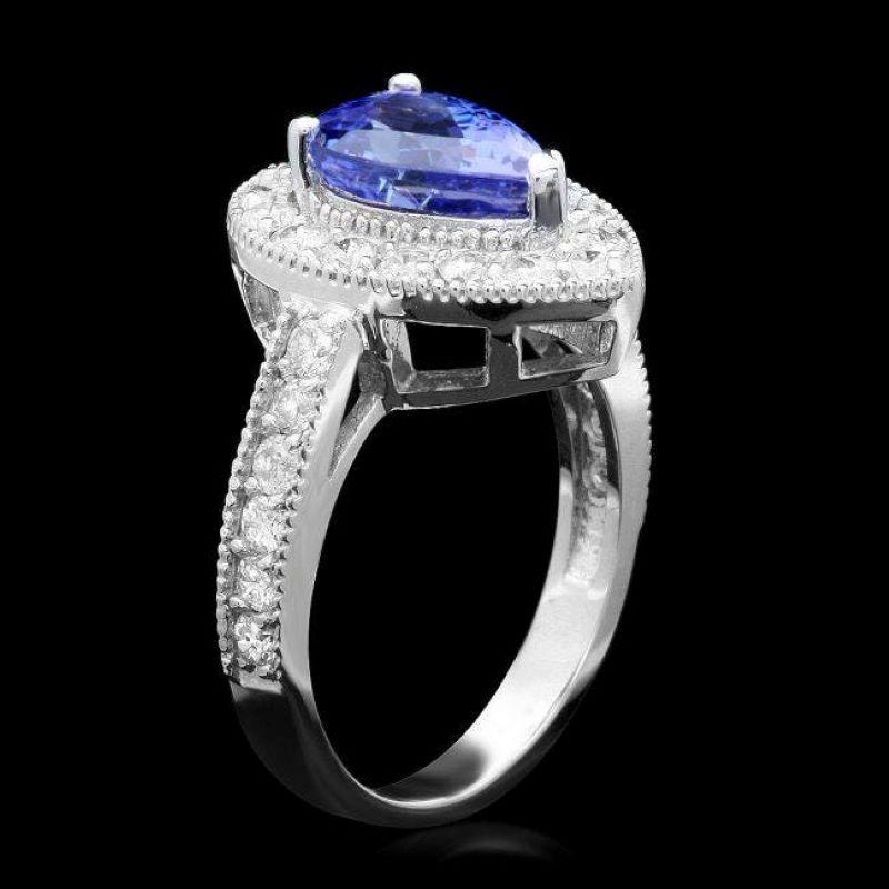3.30 Carats Natural Tanzanite and Diamond 14K Solid White Gold Ring

Total Natural Tanzanite Weight is: Approx. 2.40 Carats 

Tanzanite Measures: Approx. 9.00 x 7.00mm

Natural Round Diamonds Weight: Approx. 0.90 Carats (color G-H / Clarity
