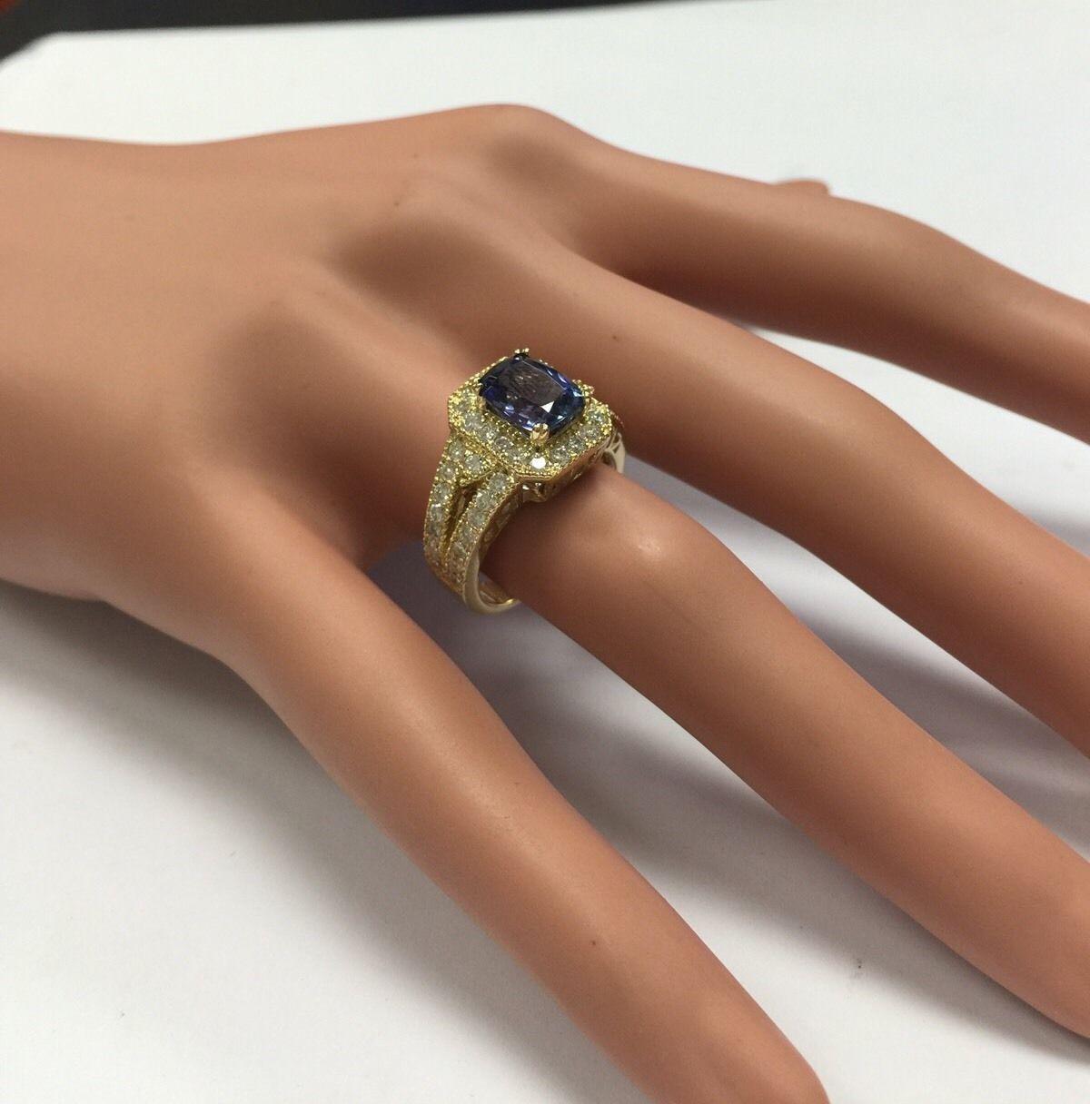 3.30 Carat Natural Tanzanite and Diamond 14 Karat Solid Yellow Gold Ring For Sale 5