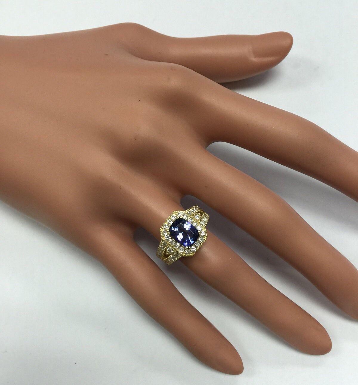 3.30 Carat Natural Tanzanite and Diamond 14 Karat Solid Yellow Gold Ring For Sale 6