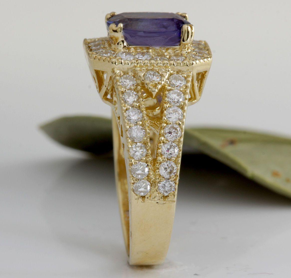 Women's 3.30 Carat Natural Tanzanite and Diamond 14 Karat Solid Yellow Gold Ring For Sale