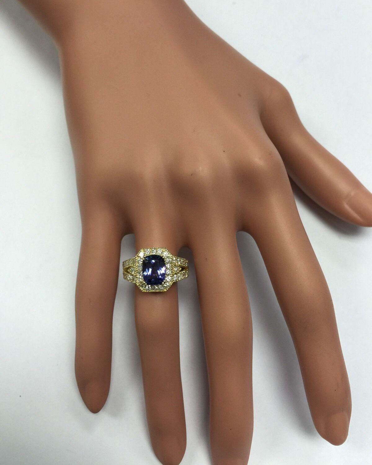 3.30 Carat Natural Tanzanite and Diamond 14 Karat Solid Yellow Gold Ring For Sale 3