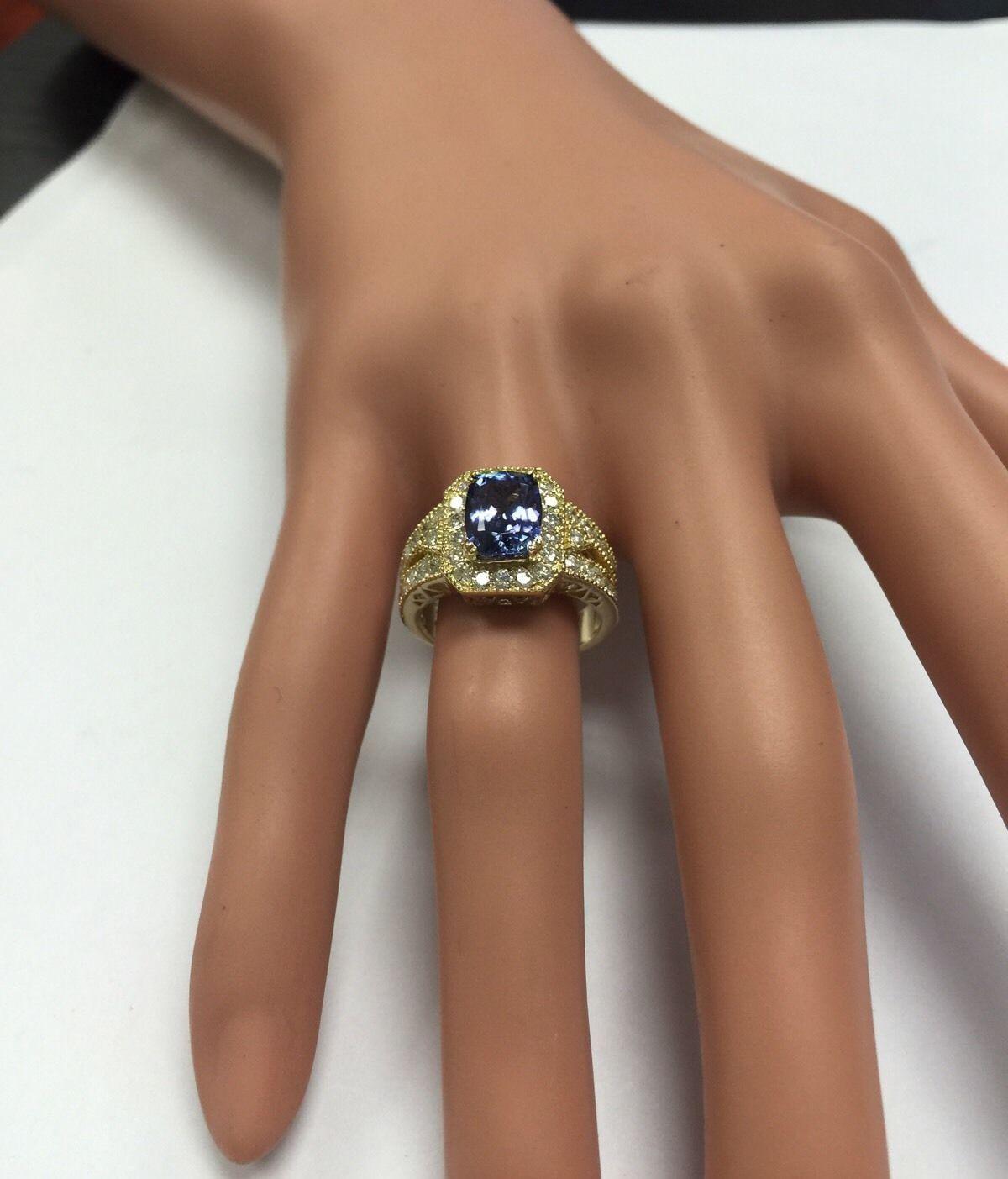 3.30 Carat Natural Tanzanite and Diamond 14 Karat Solid Yellow Gold Ring For Sale 4