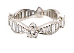 3.30 Carats Total Pear and Baguette Cut Diamond Eternity Band Ring in Platinum