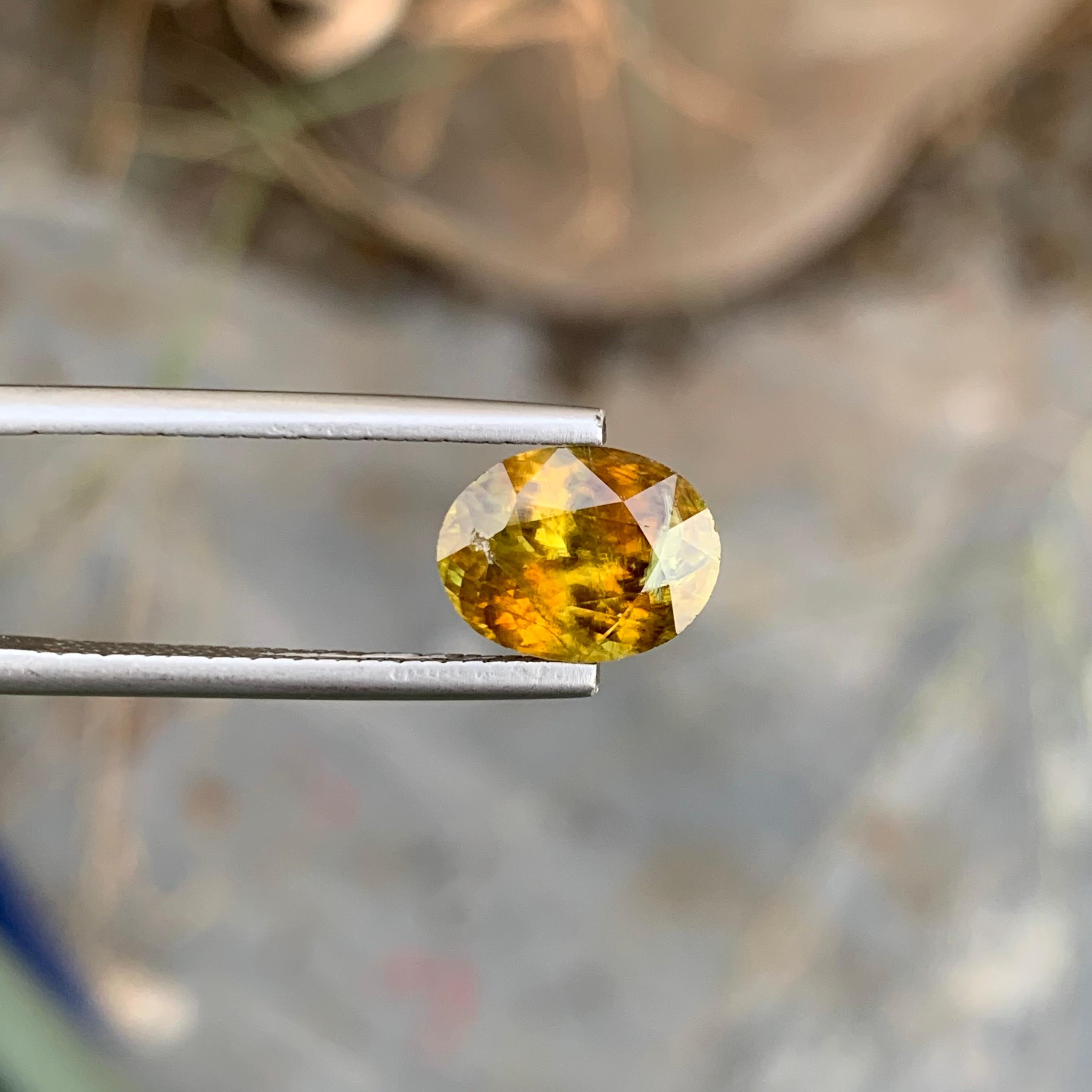 Faceted Sphene 
Weight: 3.30 Carats 
Dimension: 10.3x7.9x5.5 Mm
Origin: Warsak Pakistan 
Color: Yellow Brown
Shape: Oval
Treatment: non
Certificate: On Customer Demand 
Sphene, also known as titanite, is a mesmerizing mineral that captivates the