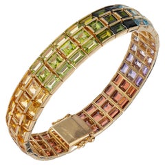 Bracelet à trois rangées de grenat, citrine, améthyste, péridot et topaze de 33,00 carats