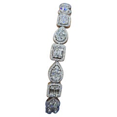 Bracelet tennis serti de 33,07 carats de diamants à monture invisible