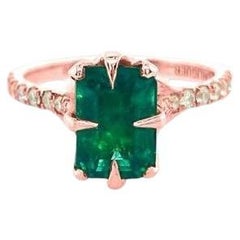3.30ct Emerald and diamond ring set in 18ct rose gold