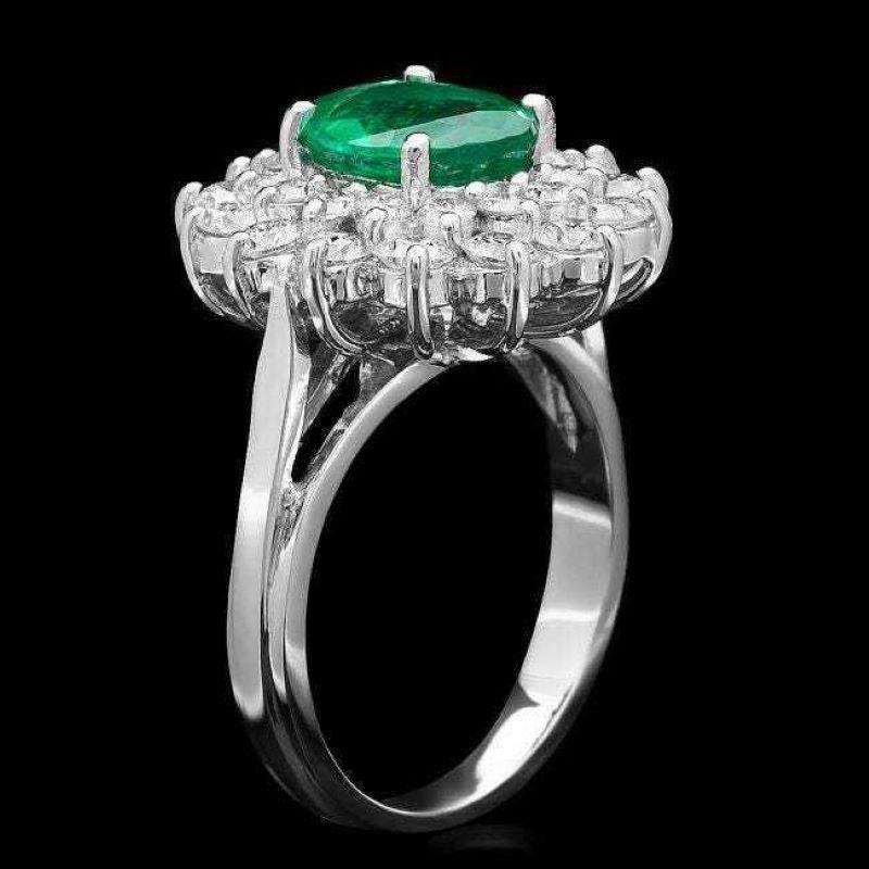 3.30 Carats Natural Emerald and Diamond 14K Solid White Gold Ring

Suggested Replacement Value: $7,000.00

Total Natural Green Emerald Weight is: Approx. 2.00 Carats (transparent)

Emerald Measures: 9 x 7mm

Natural Round Diamonds Weight: Approx.