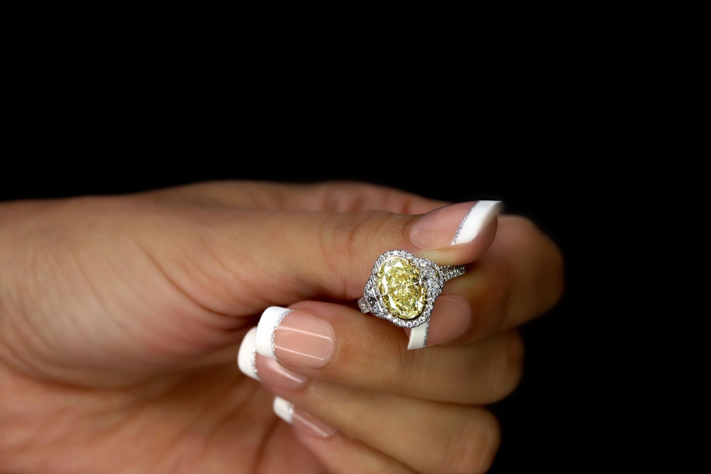 EGL Certified 3.30 Carat Oval Fancy Yellow Diamond Ring In New Condition In Calabasas, CA