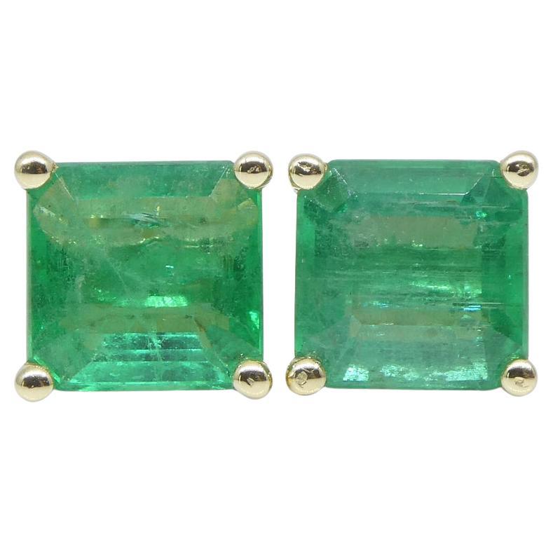 1.00ct Emerald Cut Green Emerald Stud Earrings set in 14k Yellow Gold