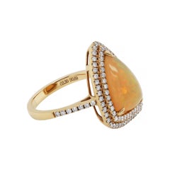 Anello cocktail in oro 18 carati con opale cabochon e diamante da 3,30 carati