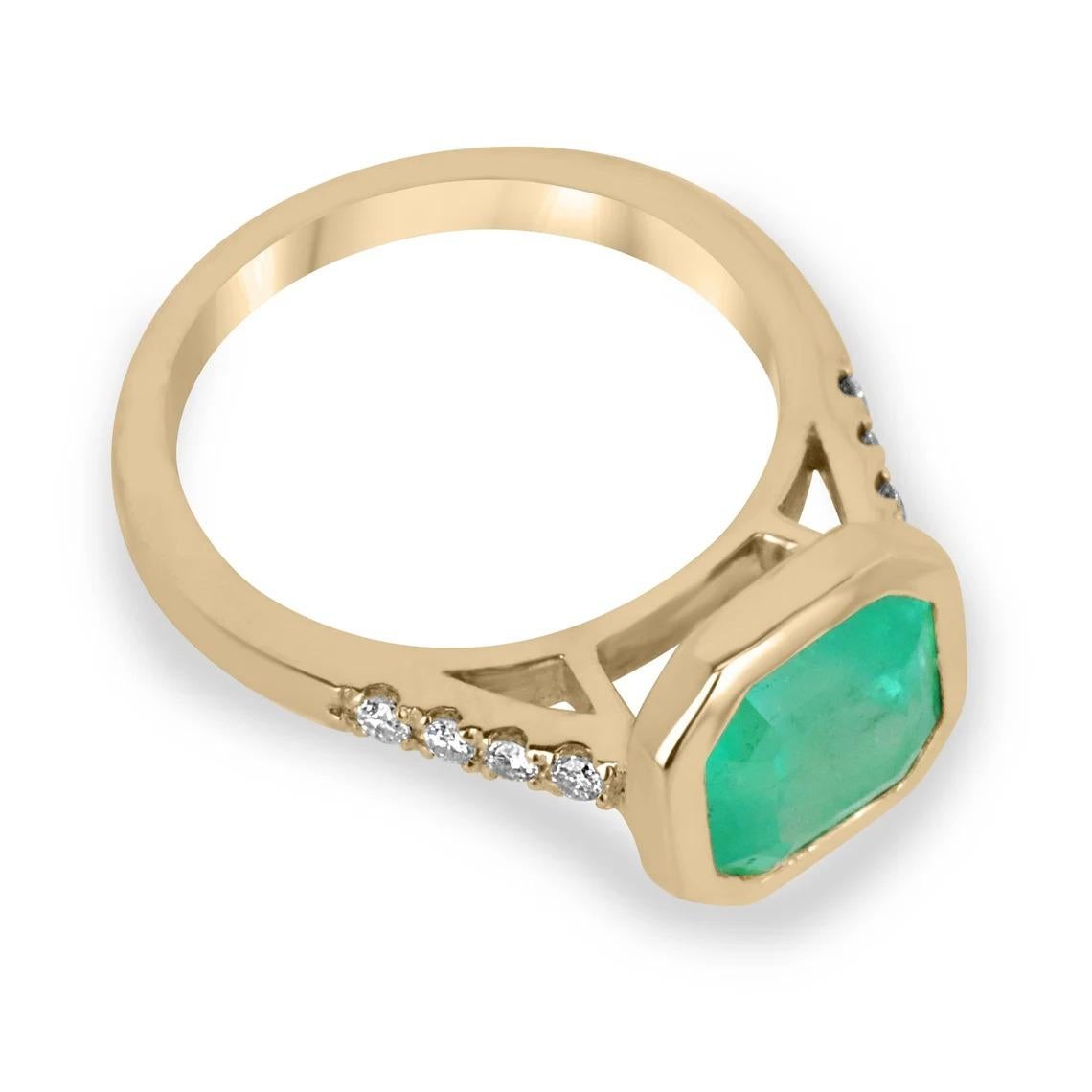 A remarkable Colombian emerald and diamond solitaire with accents engagement or right-hand ring. The center stone showcases a natural emerald with vibrant green color and good clarity. Minor natural internal inclusions are common in all earth-mined