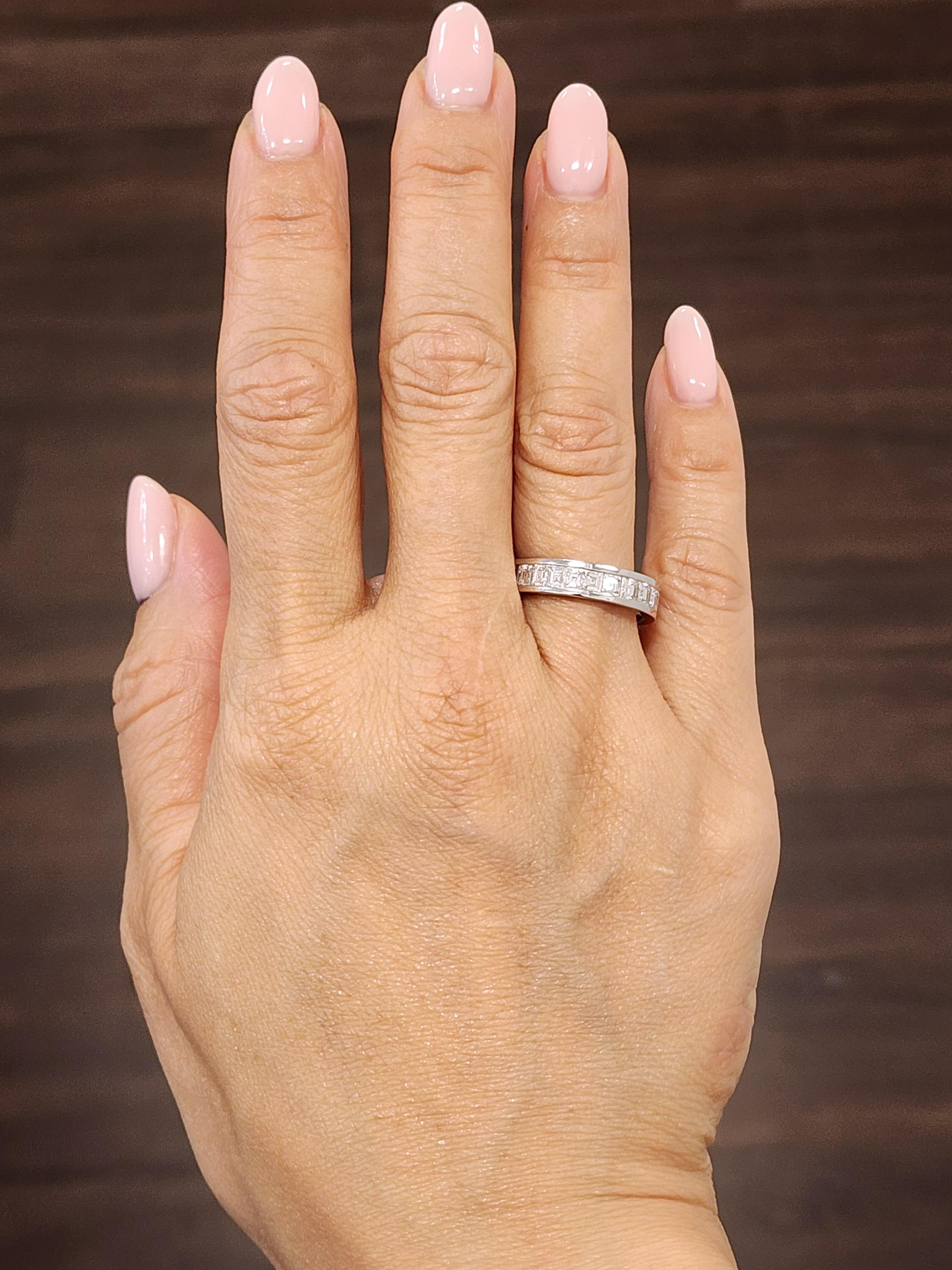 This stunning ring features 26 asscher cut diamonds set in an 18k white gold band. The diamonds boast a E/F in color and VS1 in clarity. Such a classic ring to add to any jewelry lover's collection.