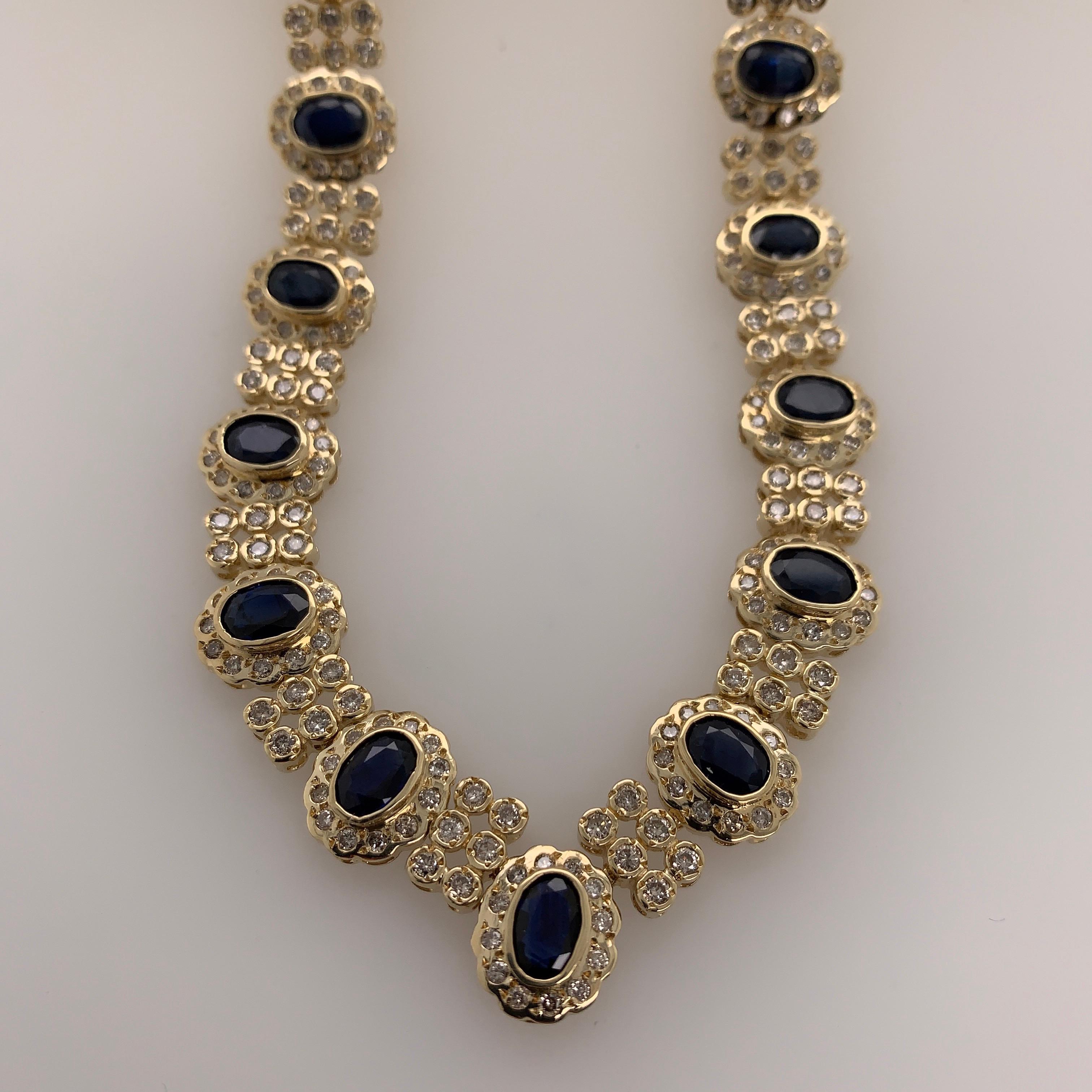 Retro Gold 33.10 Carat Natural Oval Deep Blue Sapphire and Diamond Necklace 1970 For Sale 1